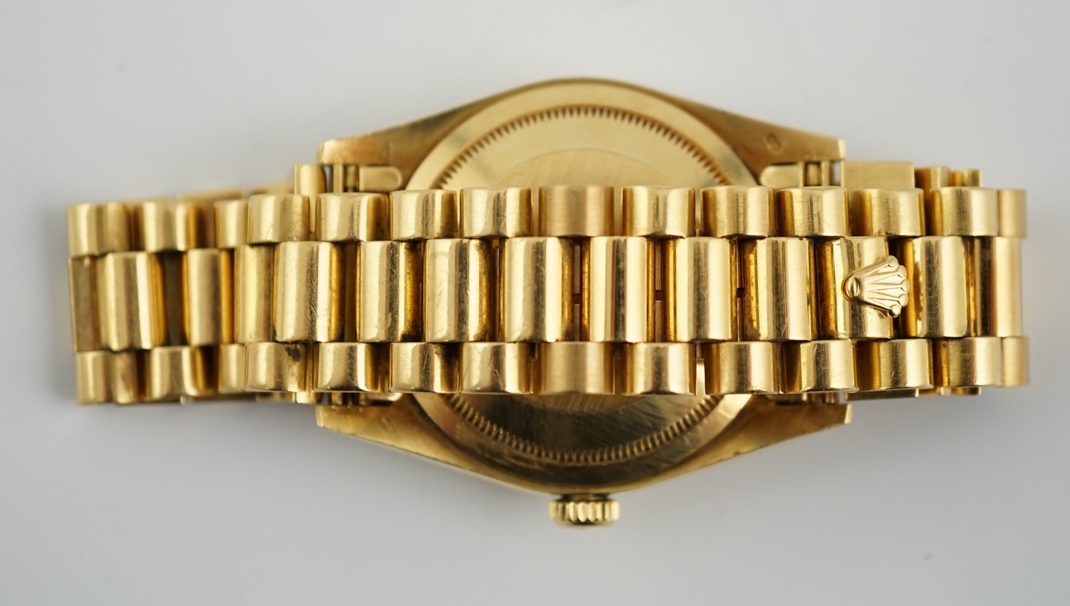 A gentleman's late 1980's 18ct gold Rolex Oyster Perpetual Day/Date wrist watch, on an 18ct gold Rolex bracelet with deployment clasp